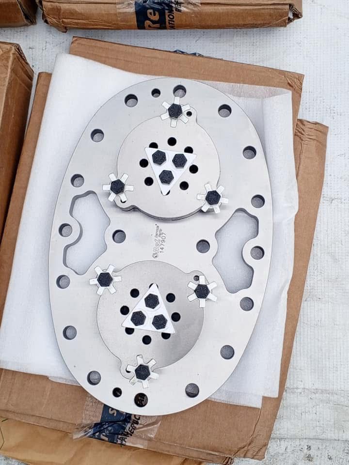 Compressor valve plate assembly